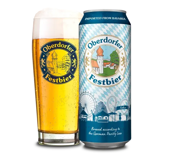 A glass of beer next to a can of Oberdorfer Festbier. Both feature the brand logo with a church tower and the village.
