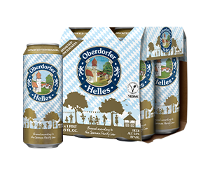 Four cans of Helles in an Oberdorfer paper carrier featuring a Bavarian diamond pattern. Next to them is another can.